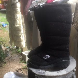 the North Face Winter Knee high Boots.